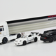 Illustration for article titled Truckin Tuesday with the New Majorette Porsche Motorsports Hauler + Race Day Hot Wheels Porsche 962